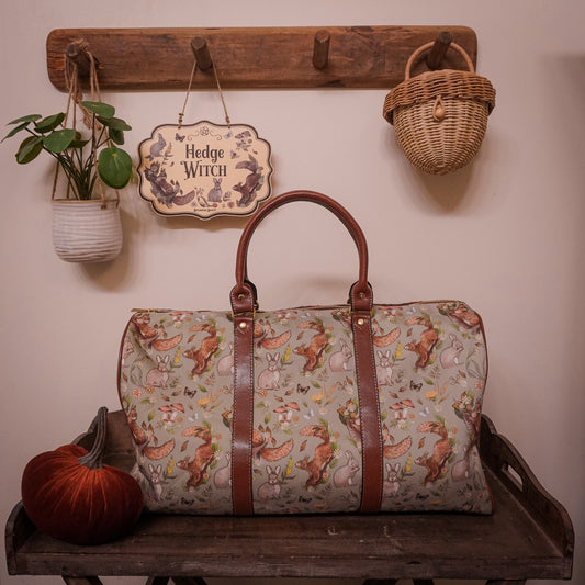 Rabbits and Squirrels - Light Green Background - Waterproof Travel Bag