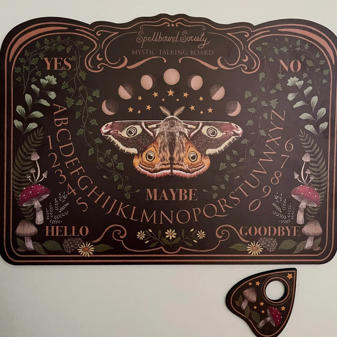 Beautiful wooden hand-drawn dark moth and mushroom ouija board spirit board for witchcraft